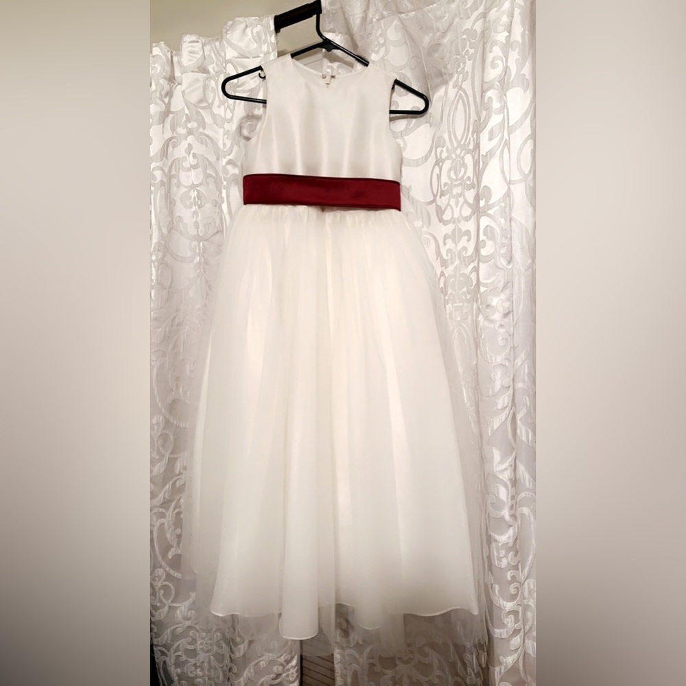 Worn as a flower girl dress in wedding